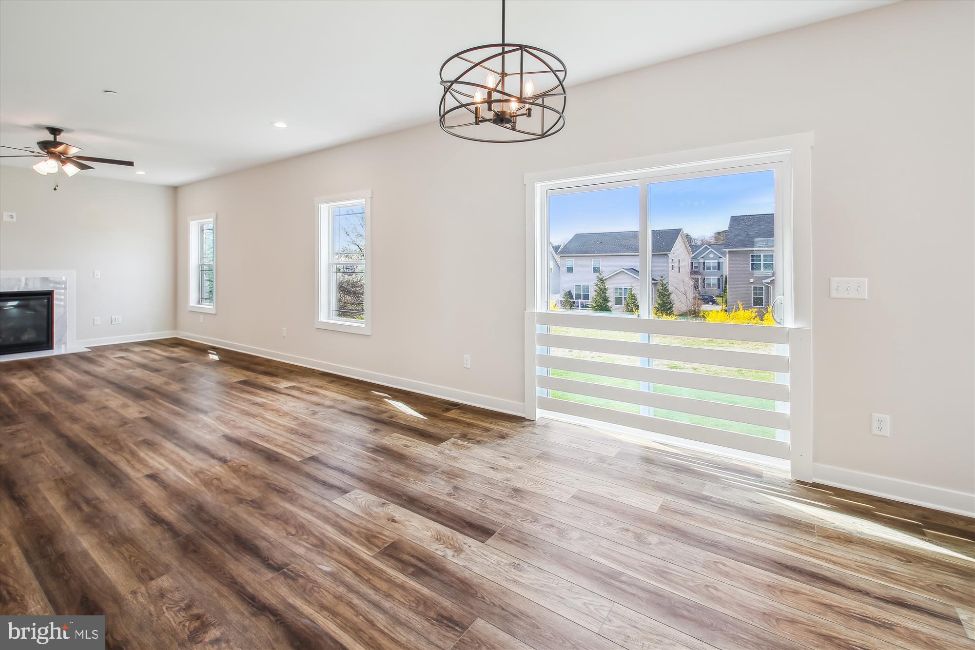 509 South Farm Crossing Road Severn, MD 21144 - Photo 11 of 35 a view of a bedroom with wooden floor and windows