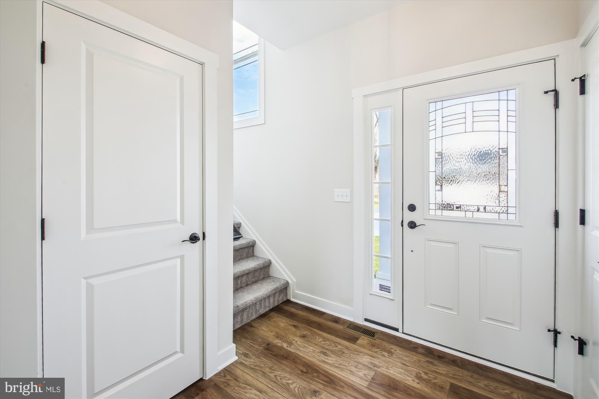 509 South Farm Crossing Road Severn, MD 21144 - Photo 17 of 35 a view of an entryway with hallway