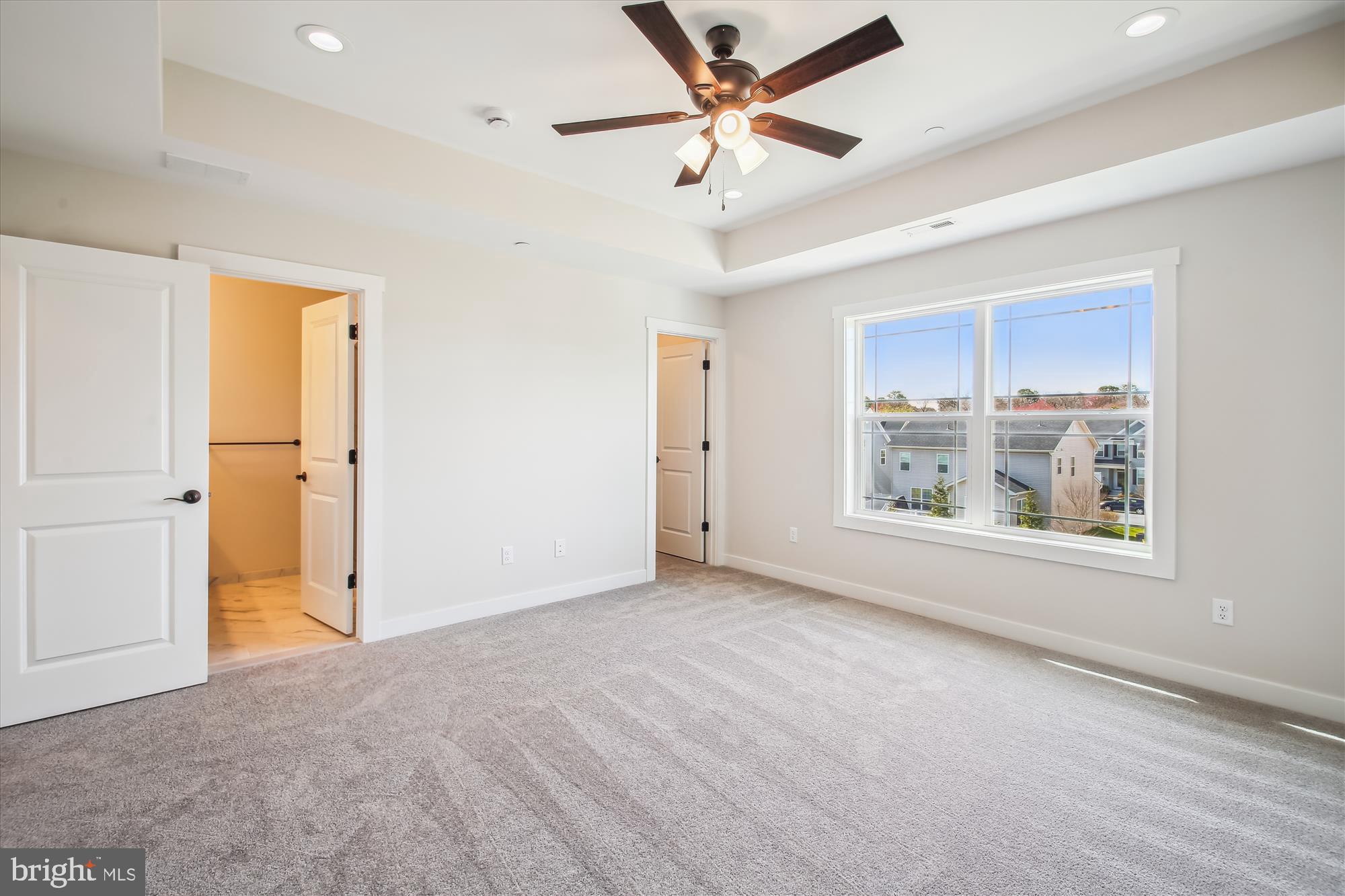 509 South Farm Crossing Road Severn, MD 21144 - Photo 20 of 35 a view of an empty room with a window