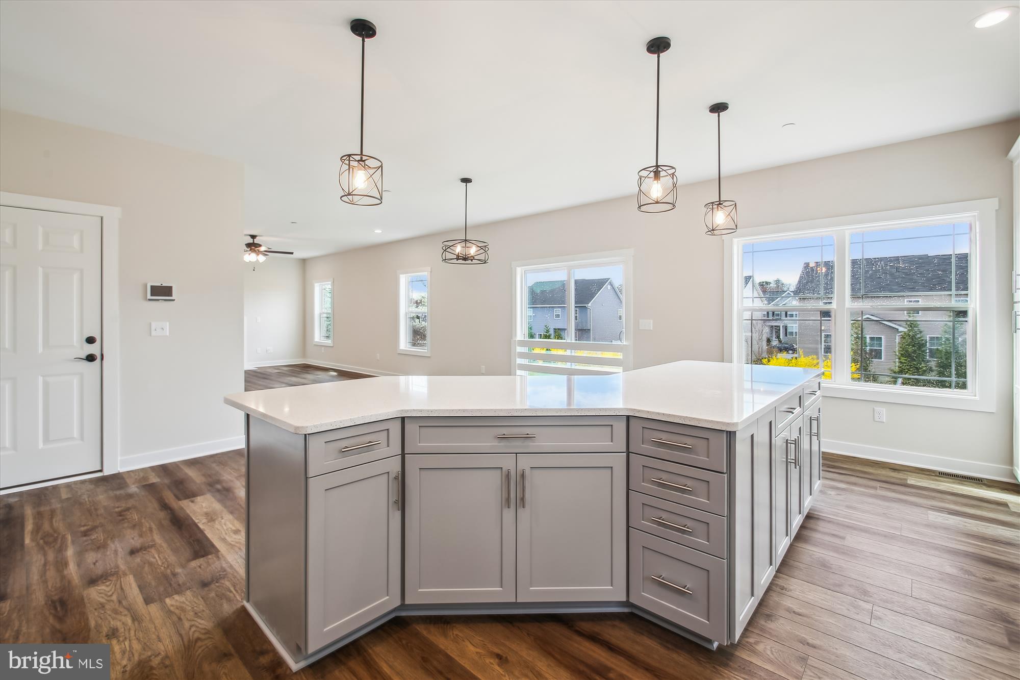509 South Farm Crossing Road Severn, MD 21144 - Photo 2 of 35 a kitchen with a sink stove and wooden floor