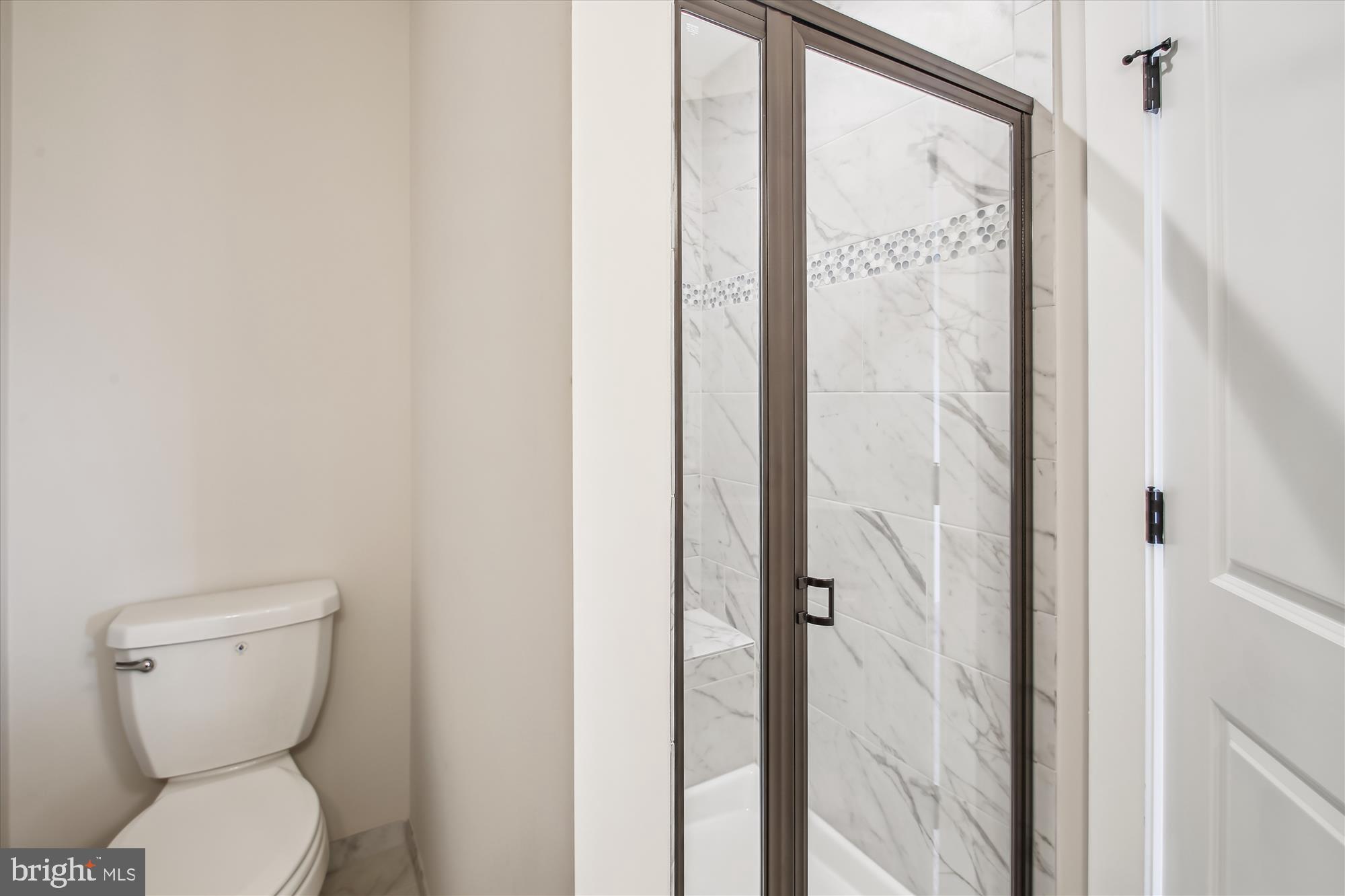 509 South Farm Crossing Road Severn, MD 21144 - Photo 24 of 35 a bathroom with a toilet and a shower