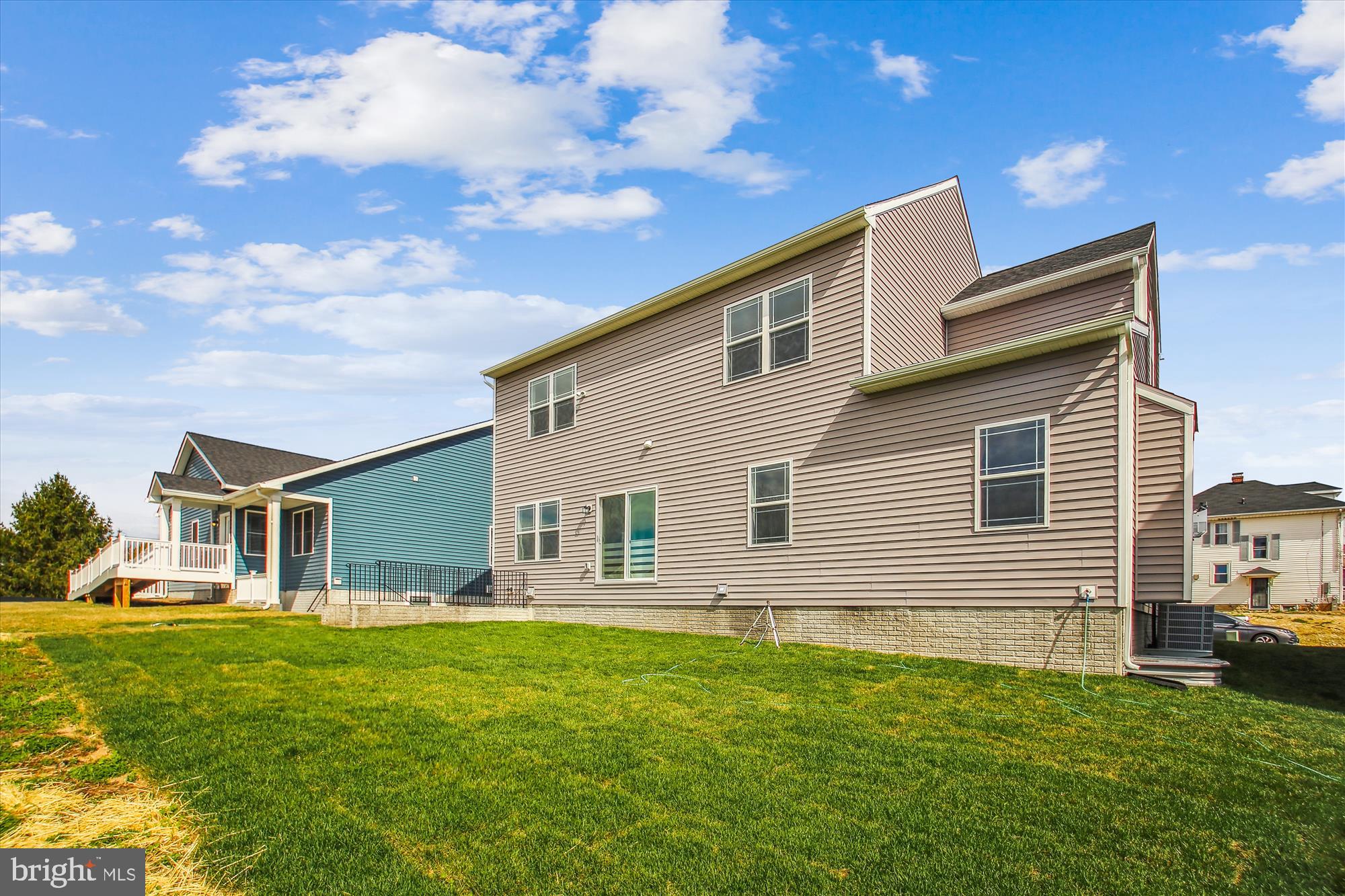 509 South Farm Crossing Road Severn, MD 21144 - Photo 34 of 35 a backyard of a house with table and chairs