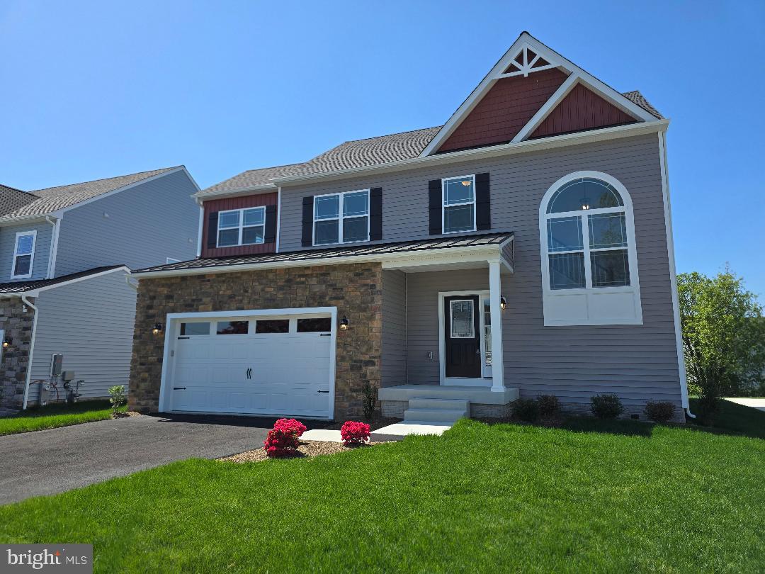 509 South Farm Crossing Road Severn, MD 21144 - Photo 7 of 35 a front view of house with yard