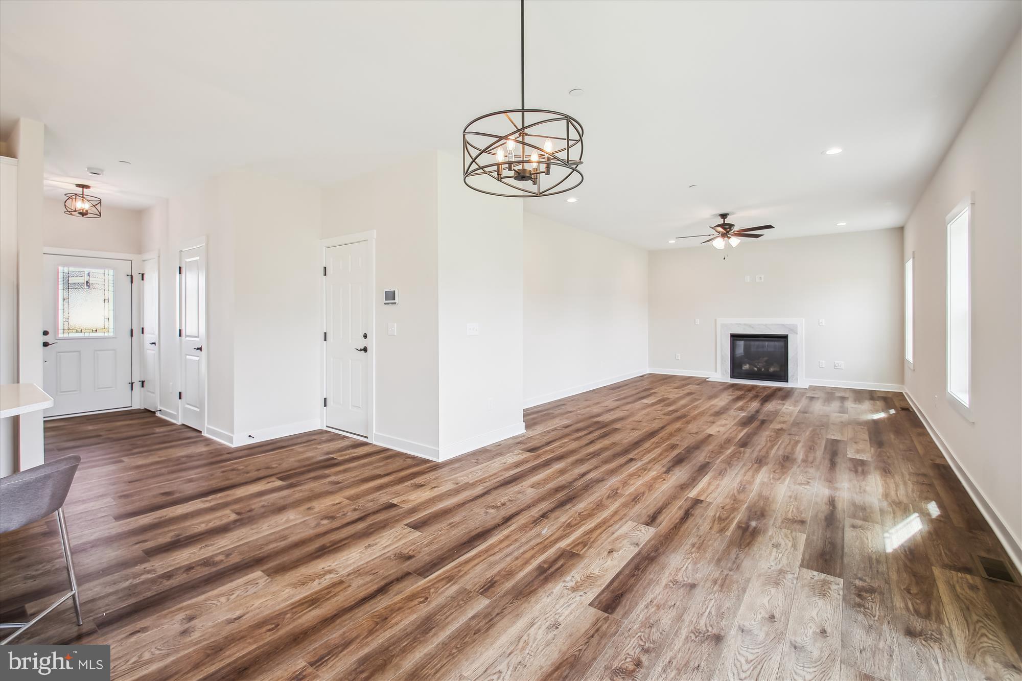 509 South Farm Crossing Road Severn, MD 21144 - Photo 9 of 35 a bedroom with a bed and a window