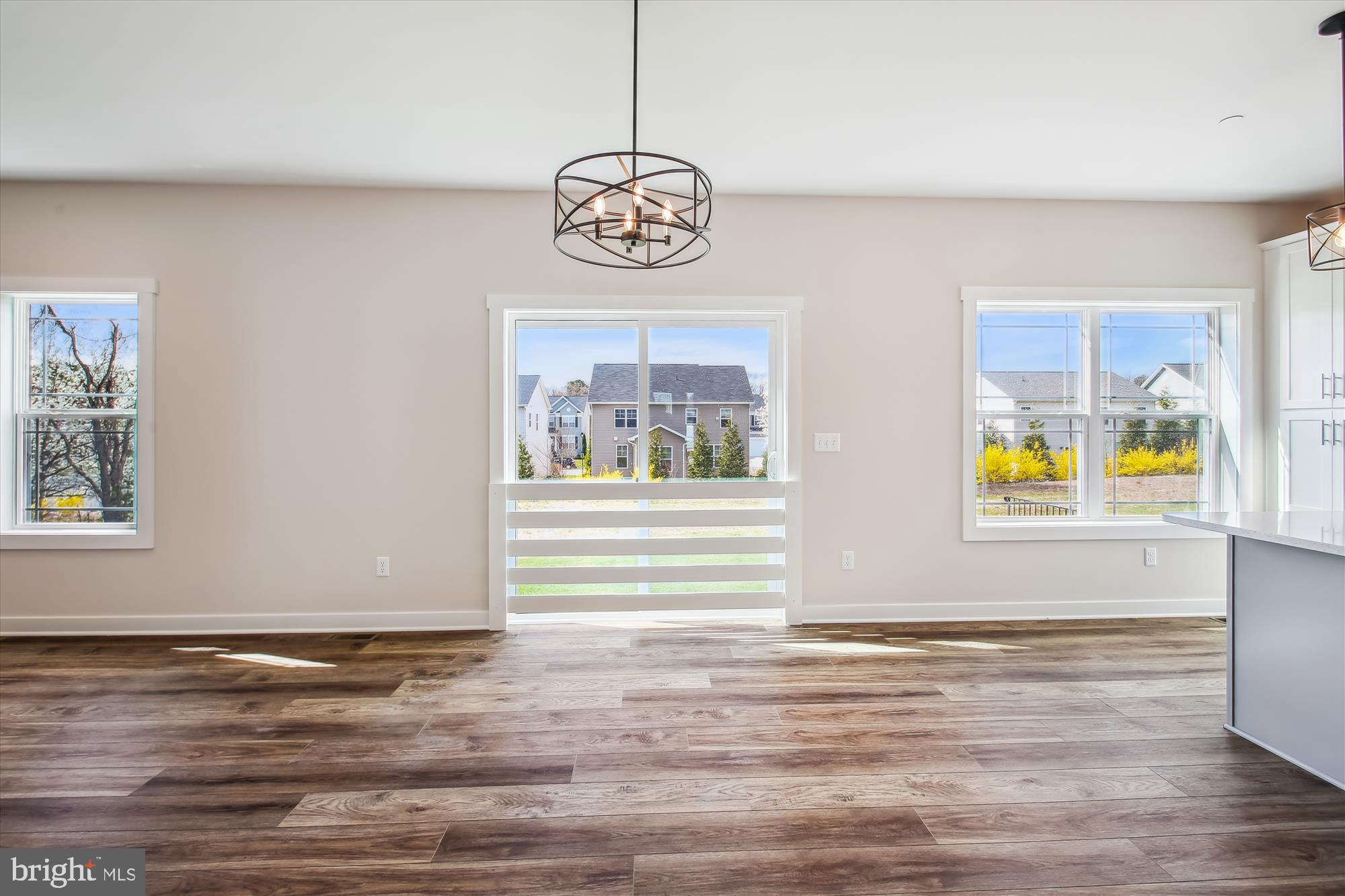 509 South Farm Crossing Road Severn, MD 21144 - Photo 10 of 35 a view of room with hardwood floor and window