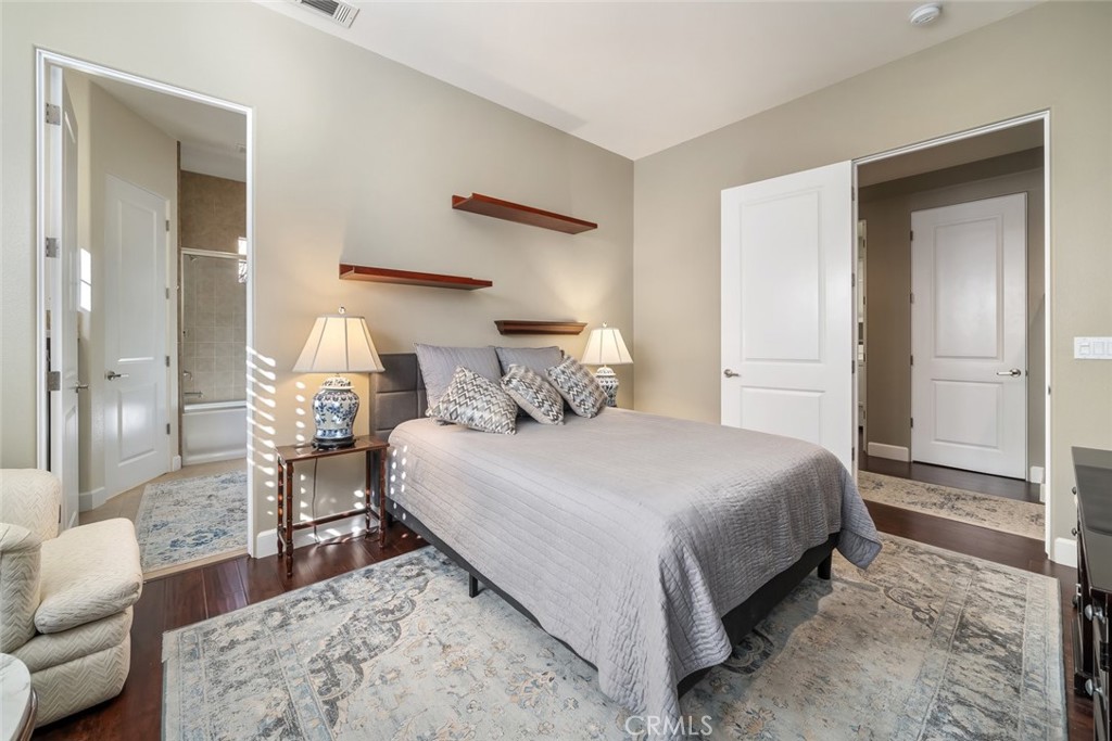 1187 Swallowtail Way Nipomo, CA 93444 - Photo 25 of 59 a bedroom with a bed and a couch