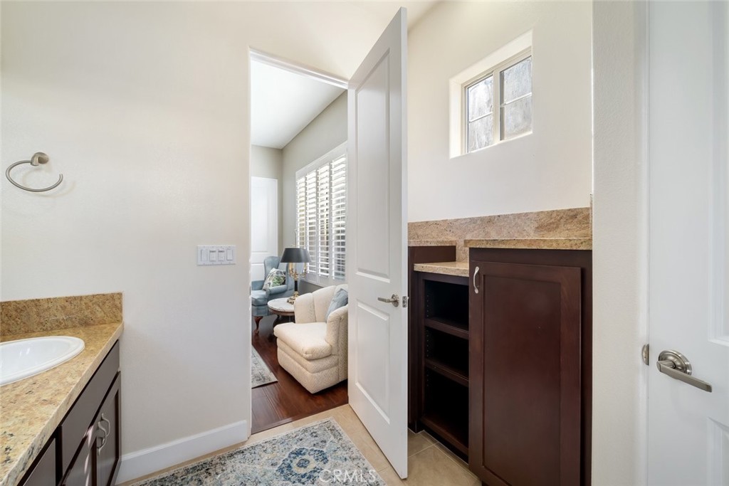 1187 Swallowtail Way Nipomo, CA 93444 - Photo 27 of 59 a living room with furniture and a fireplace