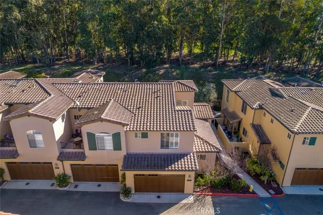 a view of a patio with a table and chairs