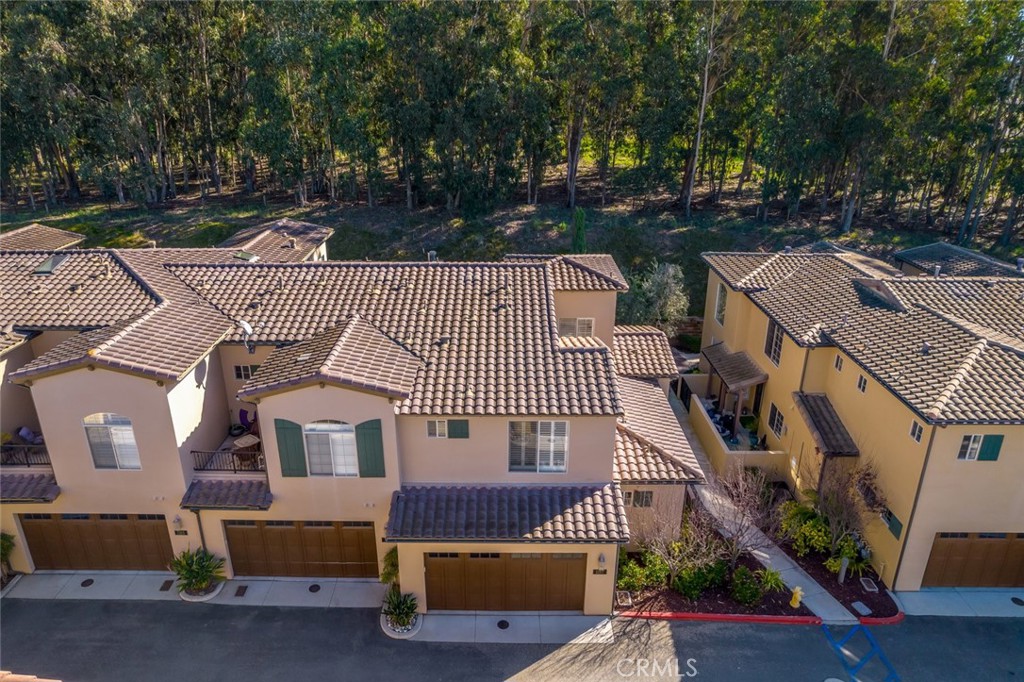 1187 Swallowtail Way Nipomo, CA 93444 - Photo 39 of 59 a view of a roof deck with couches and wooden fence