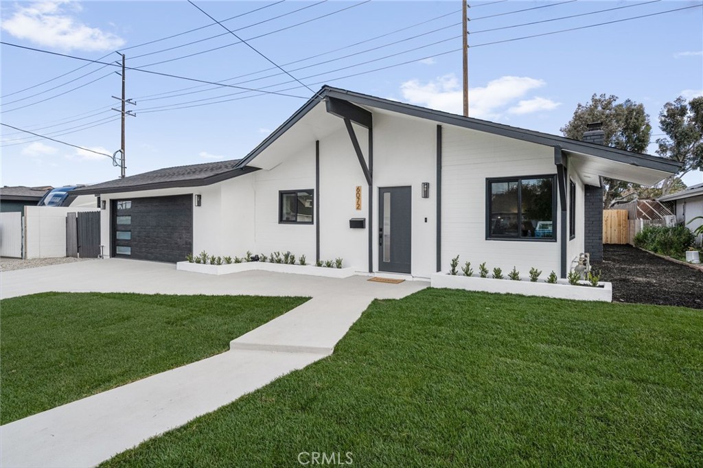 6072 Navajo Road Westminster, CA 92683 - Photo 2 of 26 a front view of house with yard
