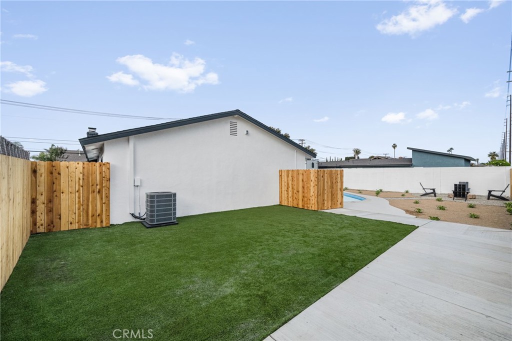 6072 Navajo Road Westminster, CA 92683 - Photo 24 of 26 a view of a house with backyard and garden