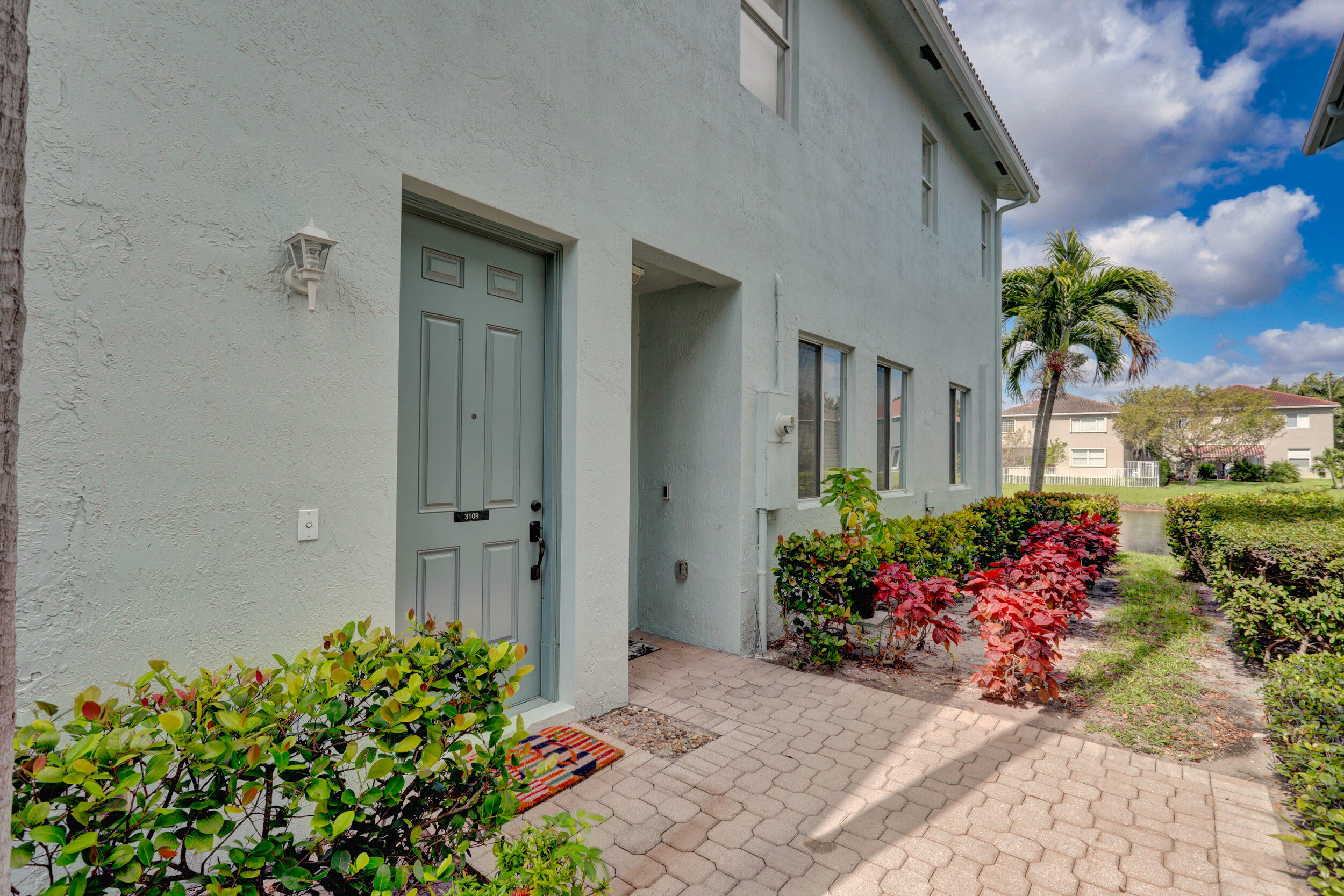 3109 Laurel Ridge Circle Riviera Beach, FL 33404 - Photo 7 of 48 Outside painted in 2021