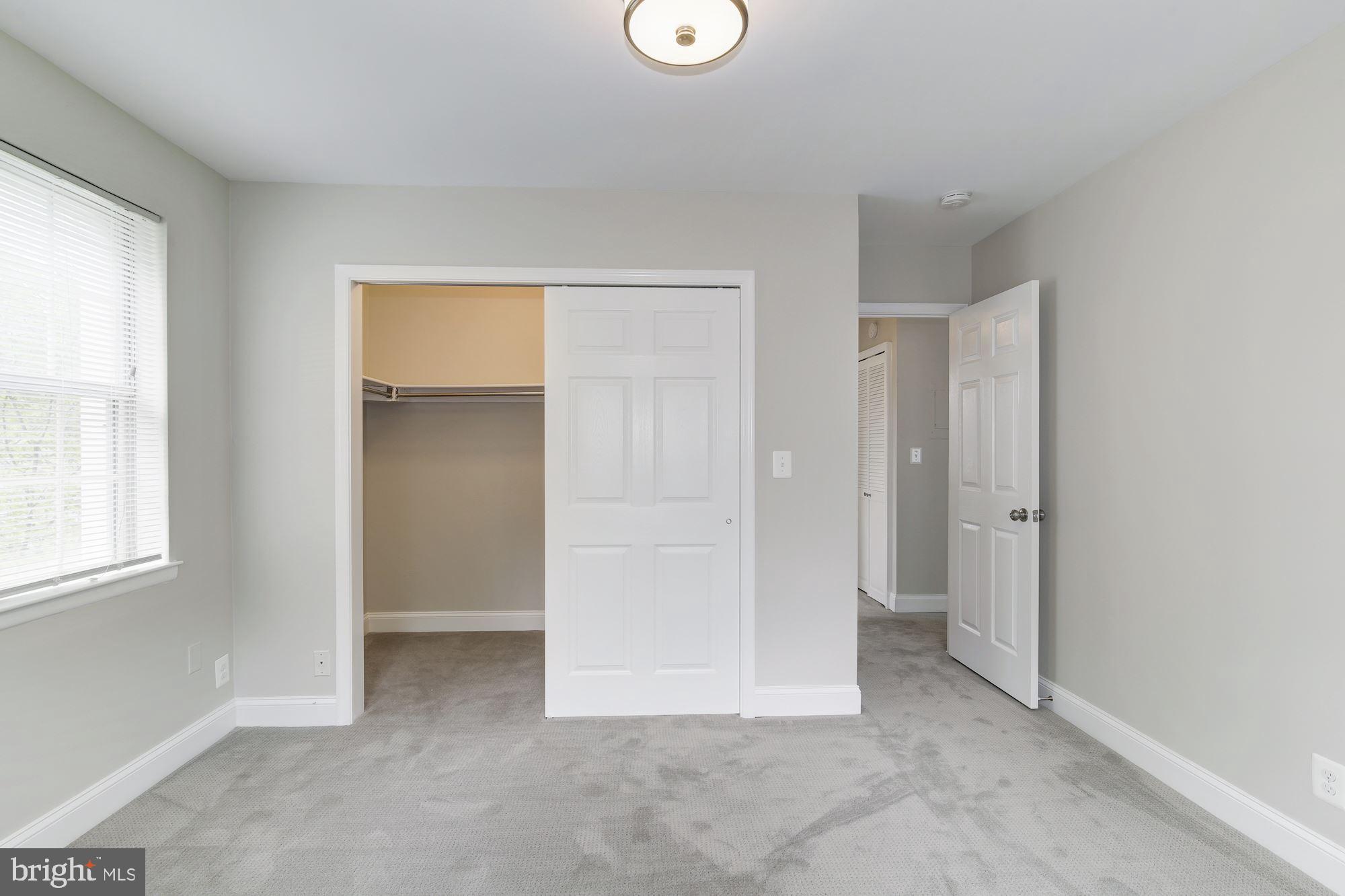 4626 B 28th Road South, Unit B Arlington, VA 22206 - Photo 14 of 22 an empty room with windows and closet