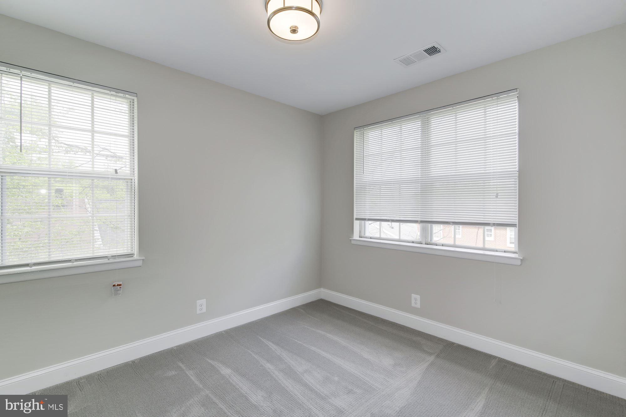 4626 B 28th Road South, Unit B Arlington, VA 22206 - Photo 15 of 22 an empty room with a window