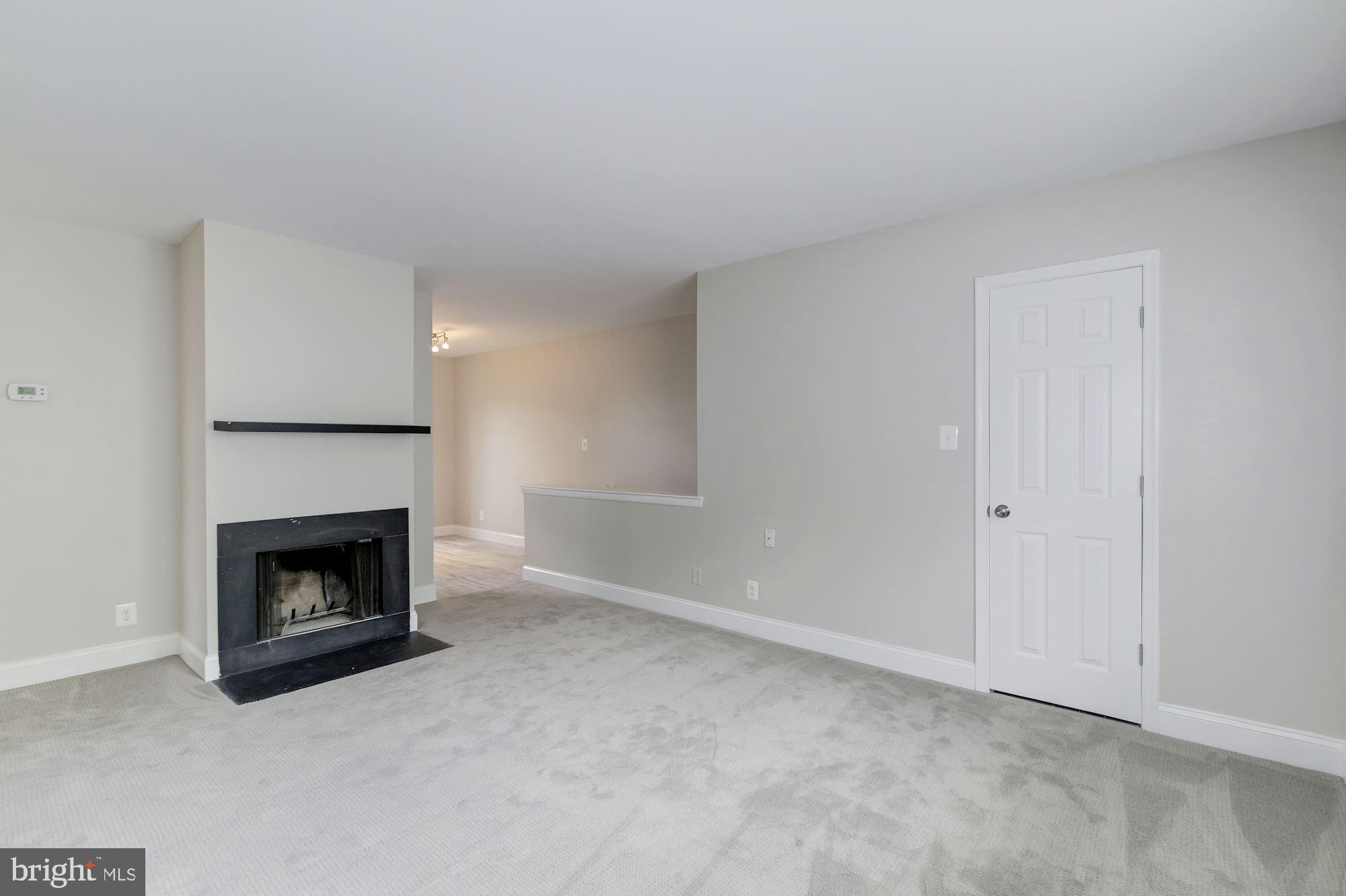 4626 B 28th Road South, Unit B Arlington, VA 22206 - Photo 4 of 22 a living room with a fireplace