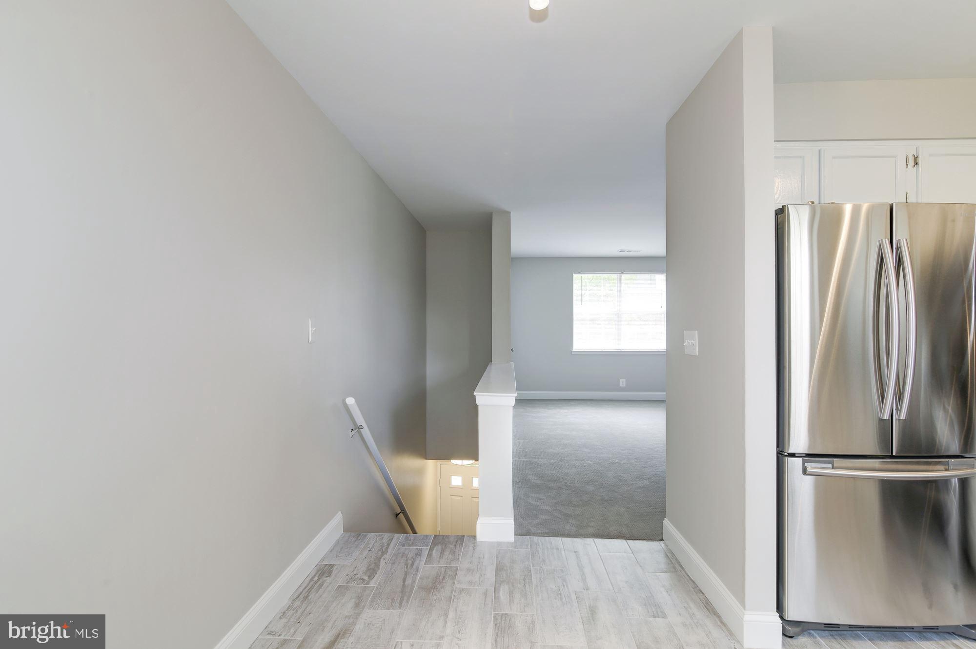 4626 B 28th Road South, Unit B Arlington, VA 22206 - Photo 7 of 22 a walk in closet with wooden floor