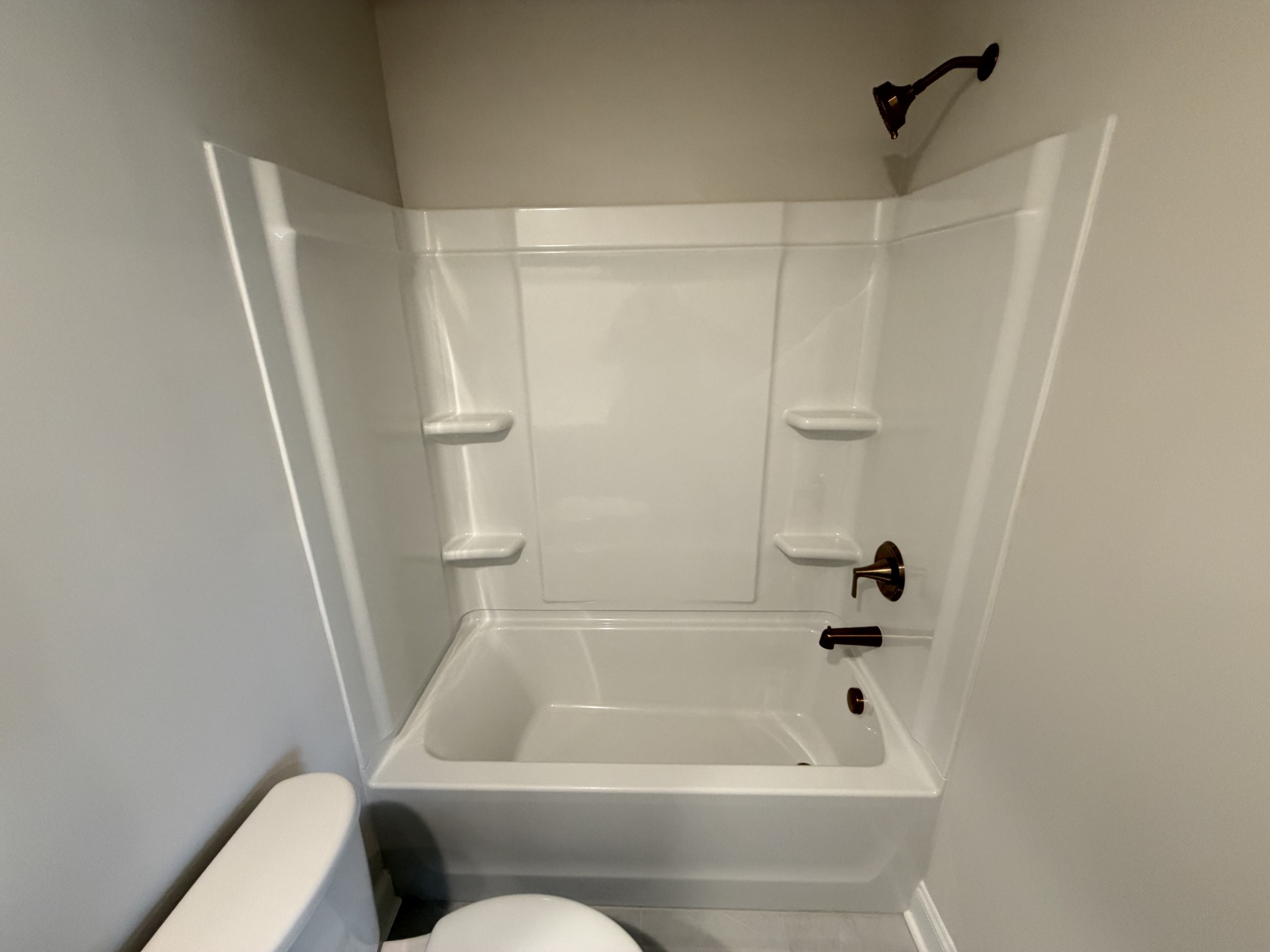 147 Emeline Way Mount Juliet, TN 37122 - Photo 32 of 41 a bathroom with a tub and a shower