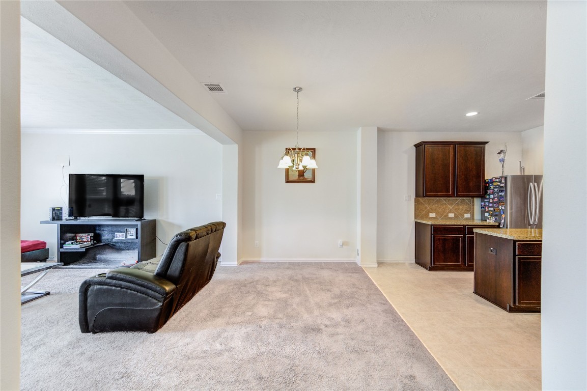 5103 Dartmoor Ridge Trail Houston, TX 77066 - Photo 8 of 47 a living room with furniture and a flat screen tv