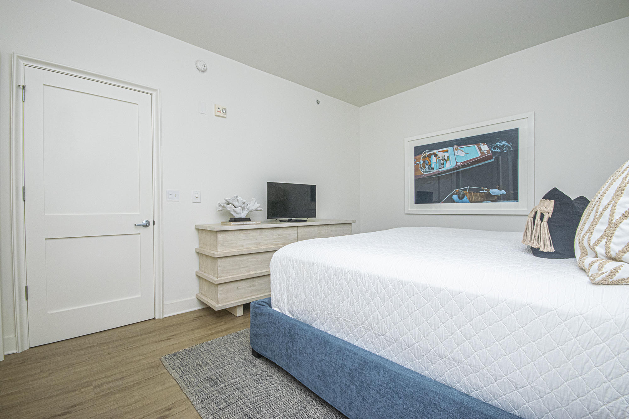 136 Georgetown Avenue, Unit 2E1 Rosemary Beach, FL 32461 - Photo 32 of 49 a bedroom with a bed and a painting on the wall