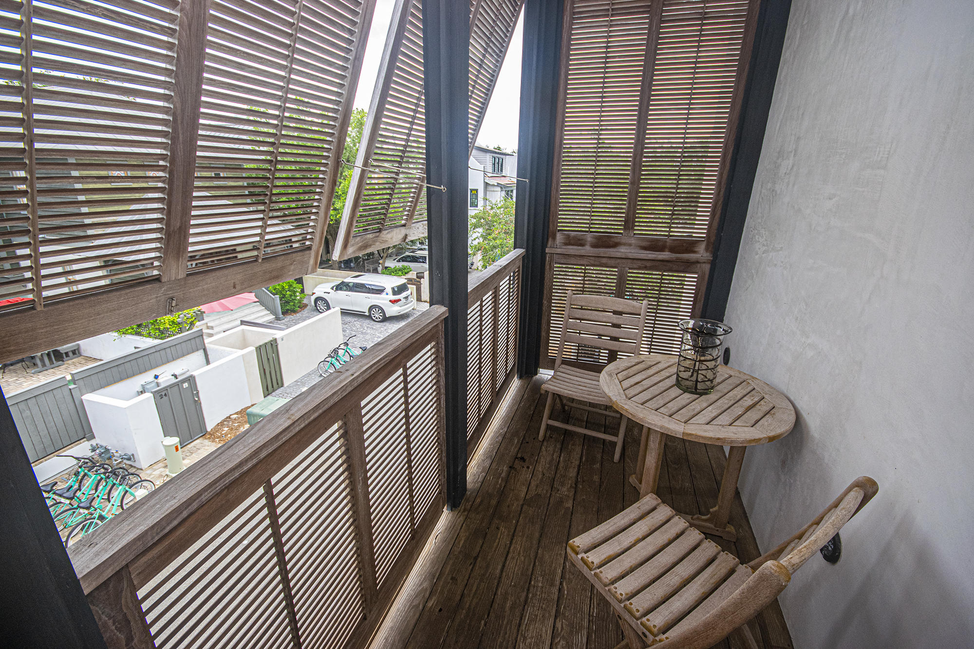 136 Georgetown Avenue, Unit 2E1 Rosemary Beach, FL 32461 - Photo 33 of 49 a porch with furniture and a window