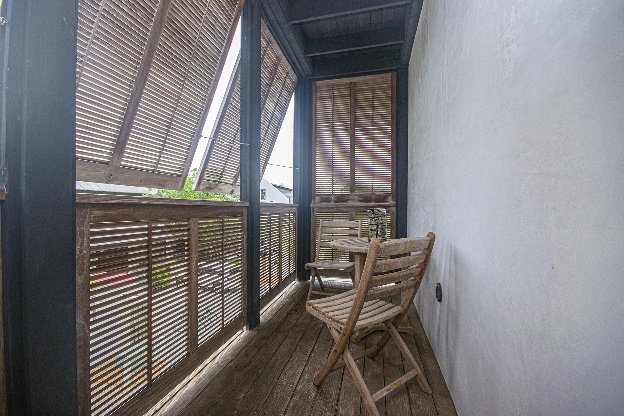 136 Georgetown Avenue, Unit 2E1 Rosemary Beach, FL 32461 - Photo 40 of 49 a view of chair and table in balcony