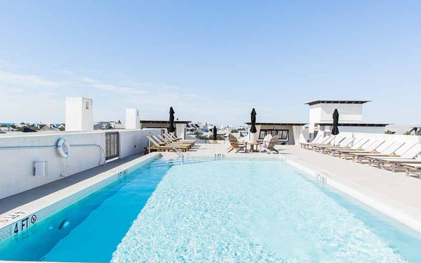 136 Georgetown Avenue, Unit 2E1 Rosemary Beach, FL 32461 - Photo 9 of 49 a living room with furniture and a table