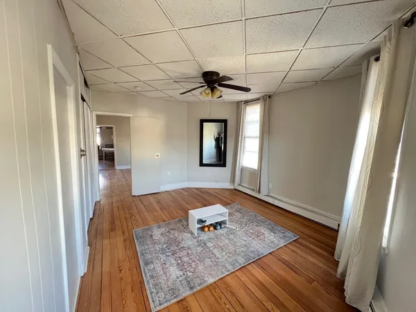 a view of livingroom with furniture and window