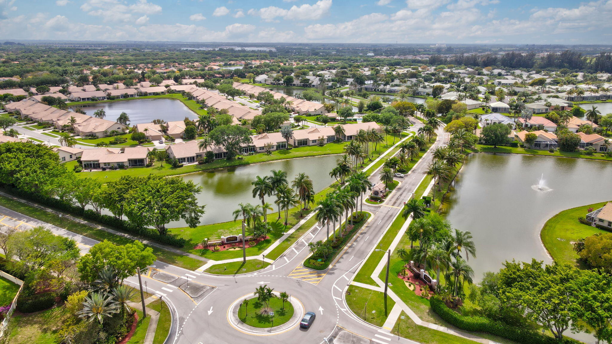 7832 Rockford Road Boynton Beach, FL 33472 - Photo 36 of 40 an aerial view of residential houses with outdoor space