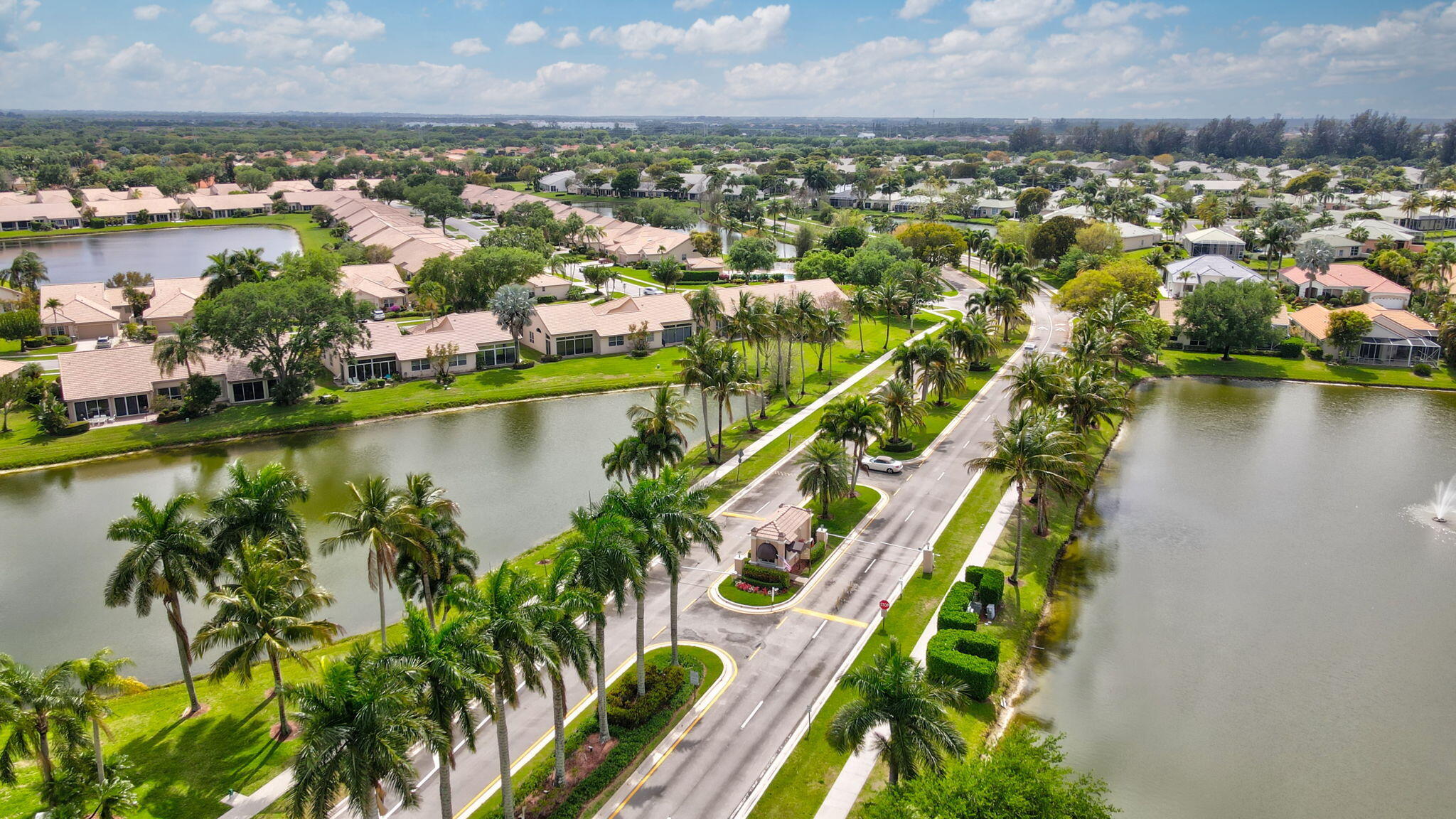 7832 Rockford Road Boynton Beach, FL 33472 - Photo 37 of 40 an aerial view of residential houses with outdoor space and lake view