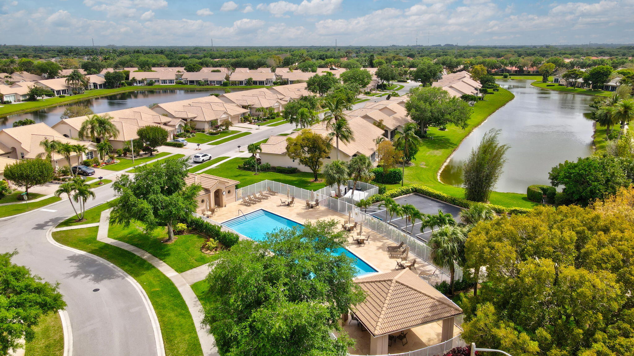 7832 Rockford Road Boynton Beach, FL 33472 - Photo 39 of 40 an aerial view of residential houses with outdoor space