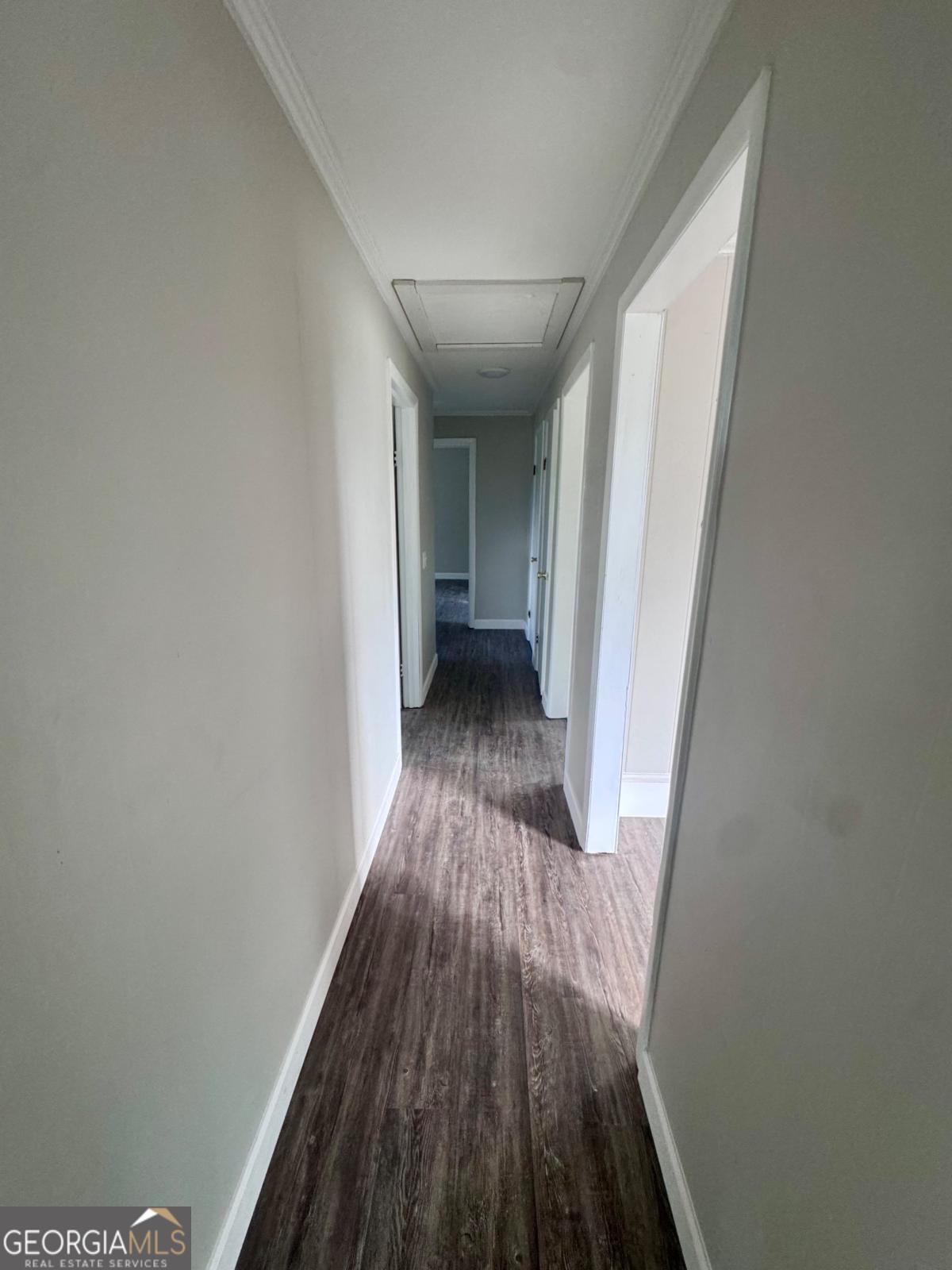 15 Dogwood Road Hazlehurst, GA 31539 - Photo 12 of 16 a view of a hallway with wooden floor
