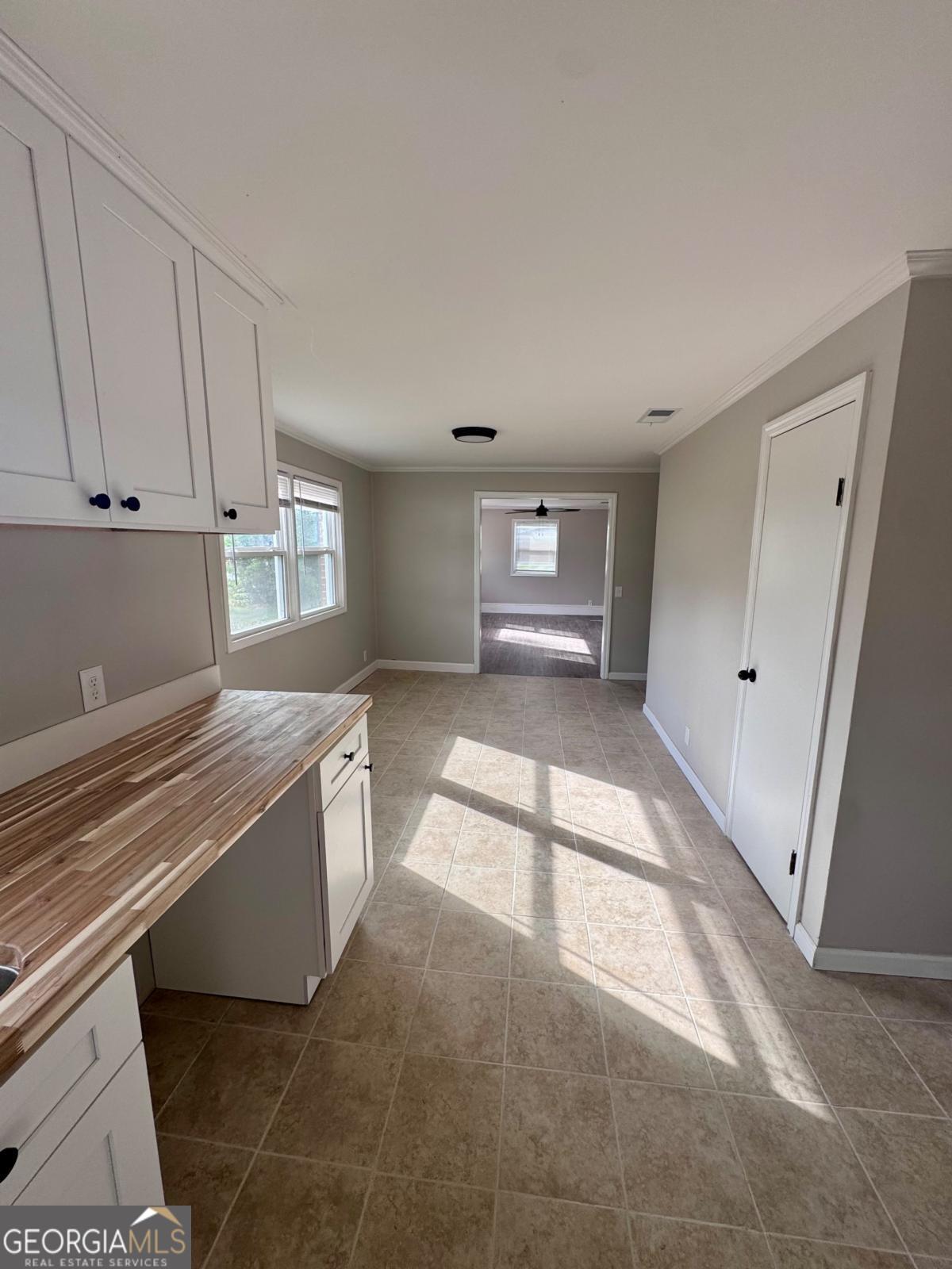 15 Dogwood Road Hazlehurst, GA 31539 - Photo 2 of 16 a view of an empty room with a window