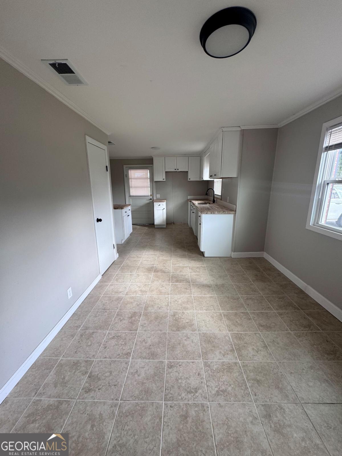 15 Dogwood Road Hazlehurst, GA 31539 - Photo 5 of 16 a view of a storage & utility room
