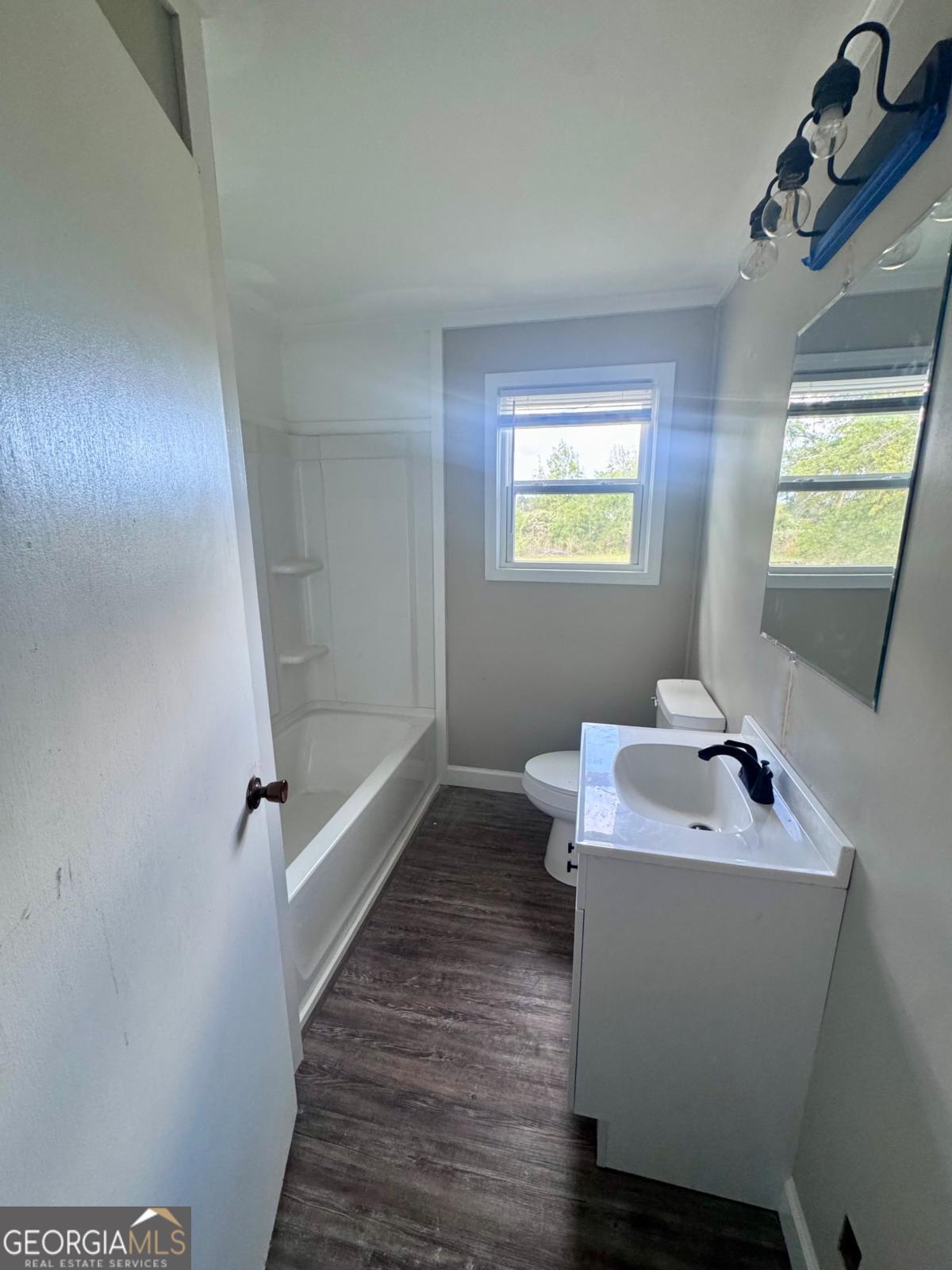15 Dogwood Road Hazlehurst, GA 31539 - Photo 10 of 16 a bathroom with a sink toilet and shower