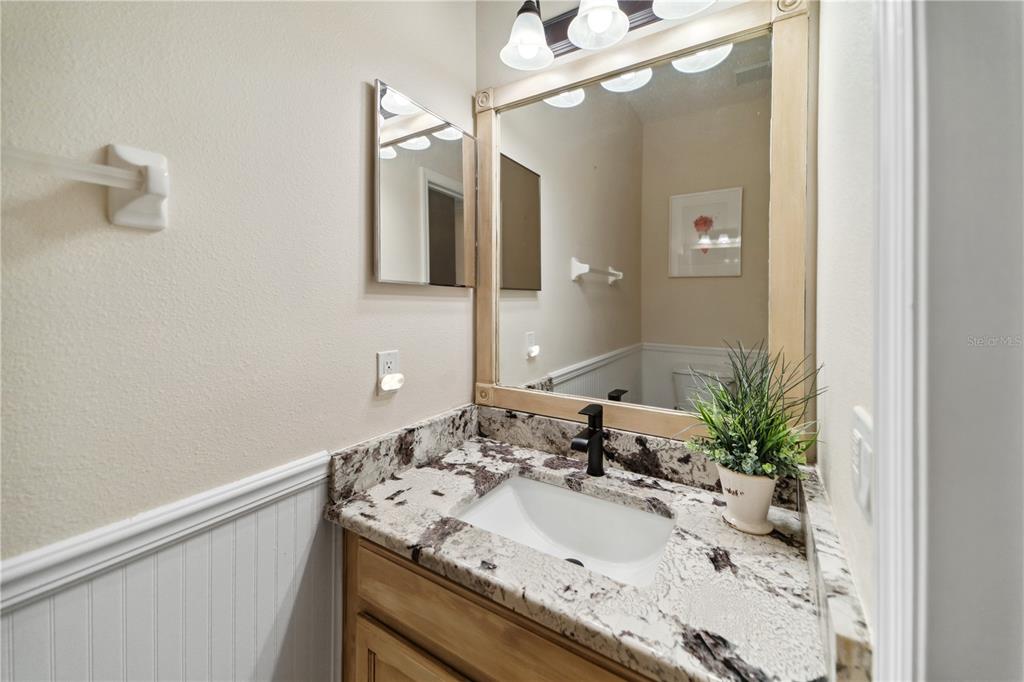 7011 Beargrass Road Harmony, FL 34773 - Photo 17 of 49 Half Bath Downstairs