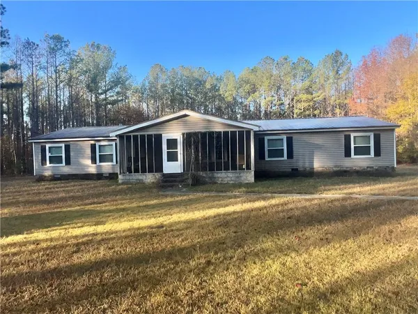 a view of a house with a swimming pool