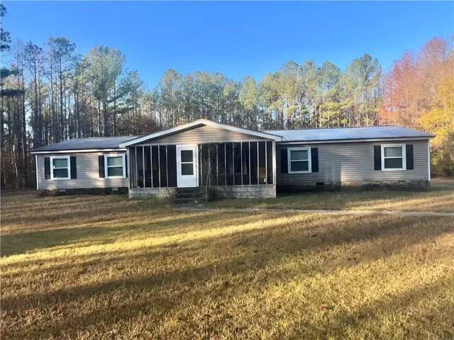 a view of a house with a swimming pool