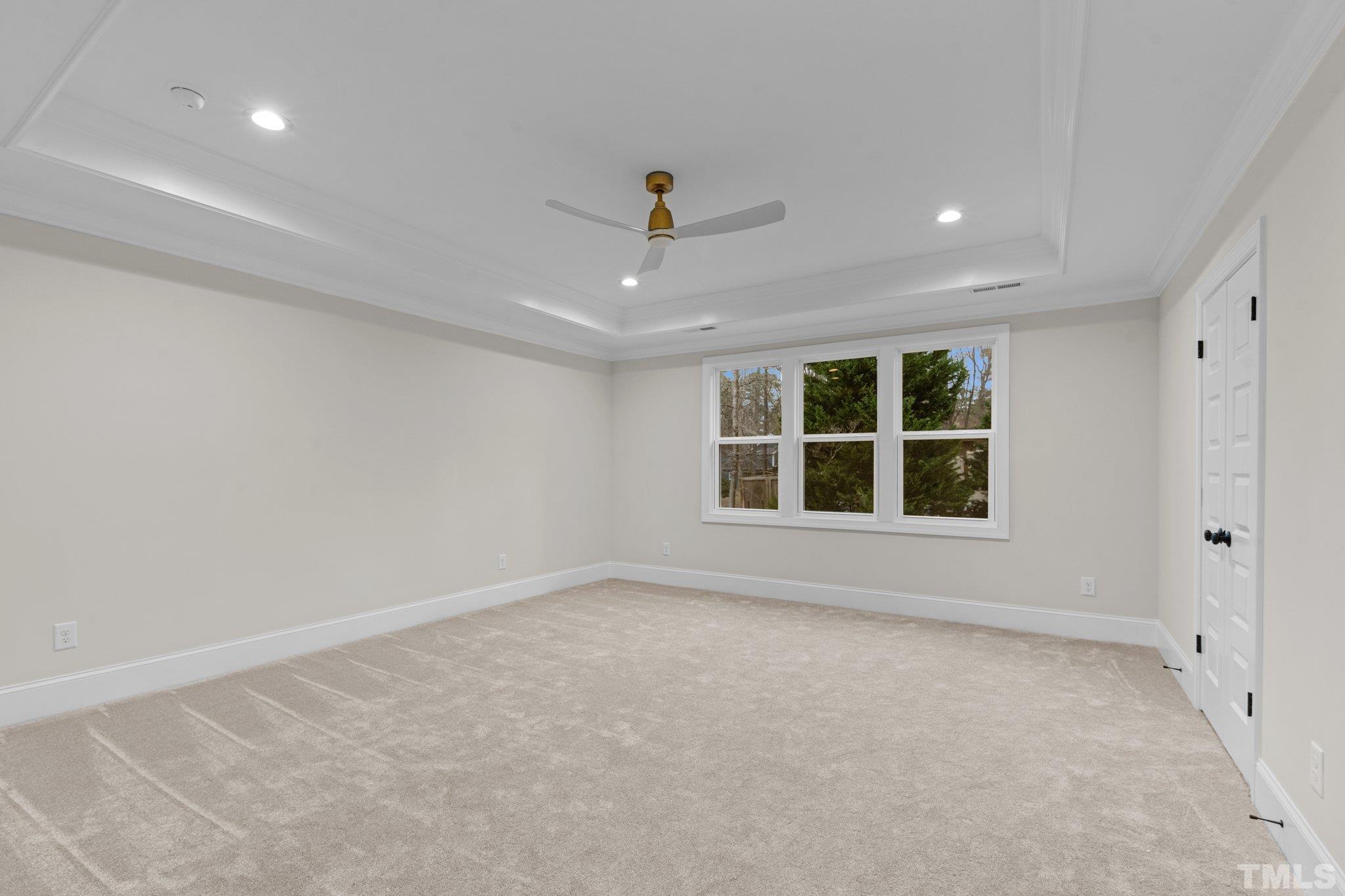 9321 Field Maple Court Raleigh, NC 27613 - Photo 24 of 44 a view of an empty room with a window