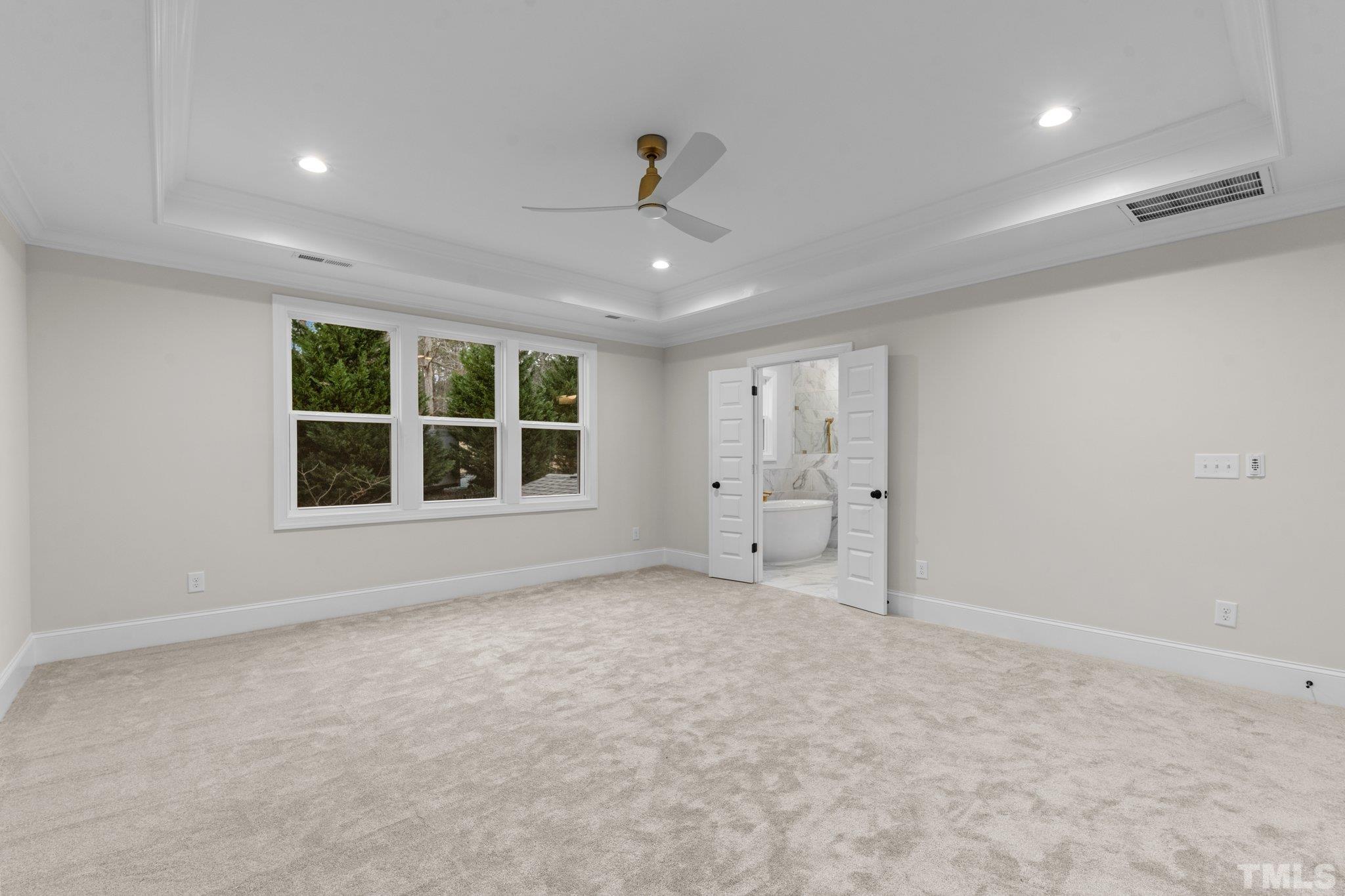 9321 Field Maple Court Raleigh, NC 27613 - Photo 25 of 44 a view of an empty room with a window