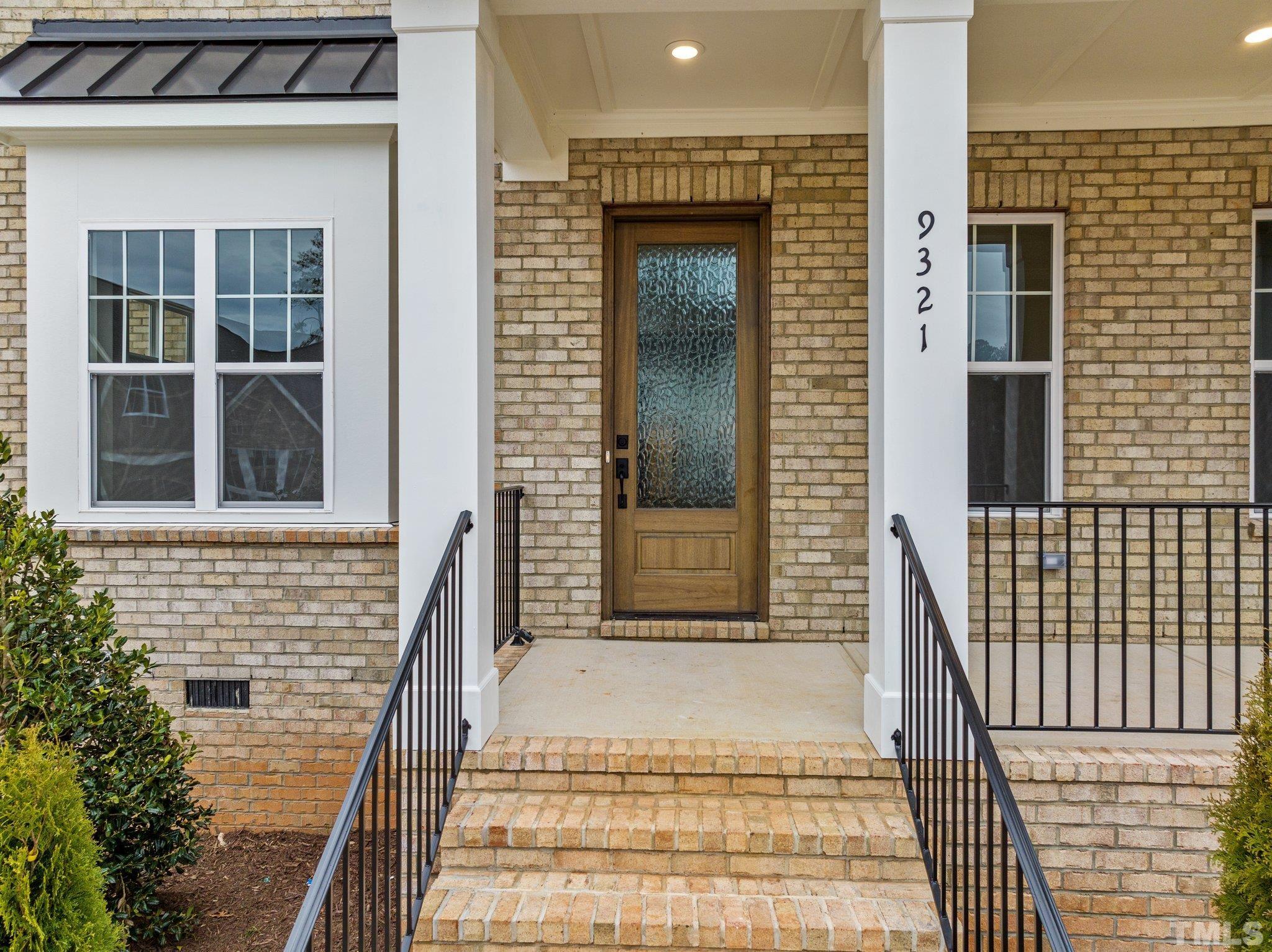 9321 Field Maple Court Raleigh, NC 27613 - Photo 3 of 44 a view of a door of the house
