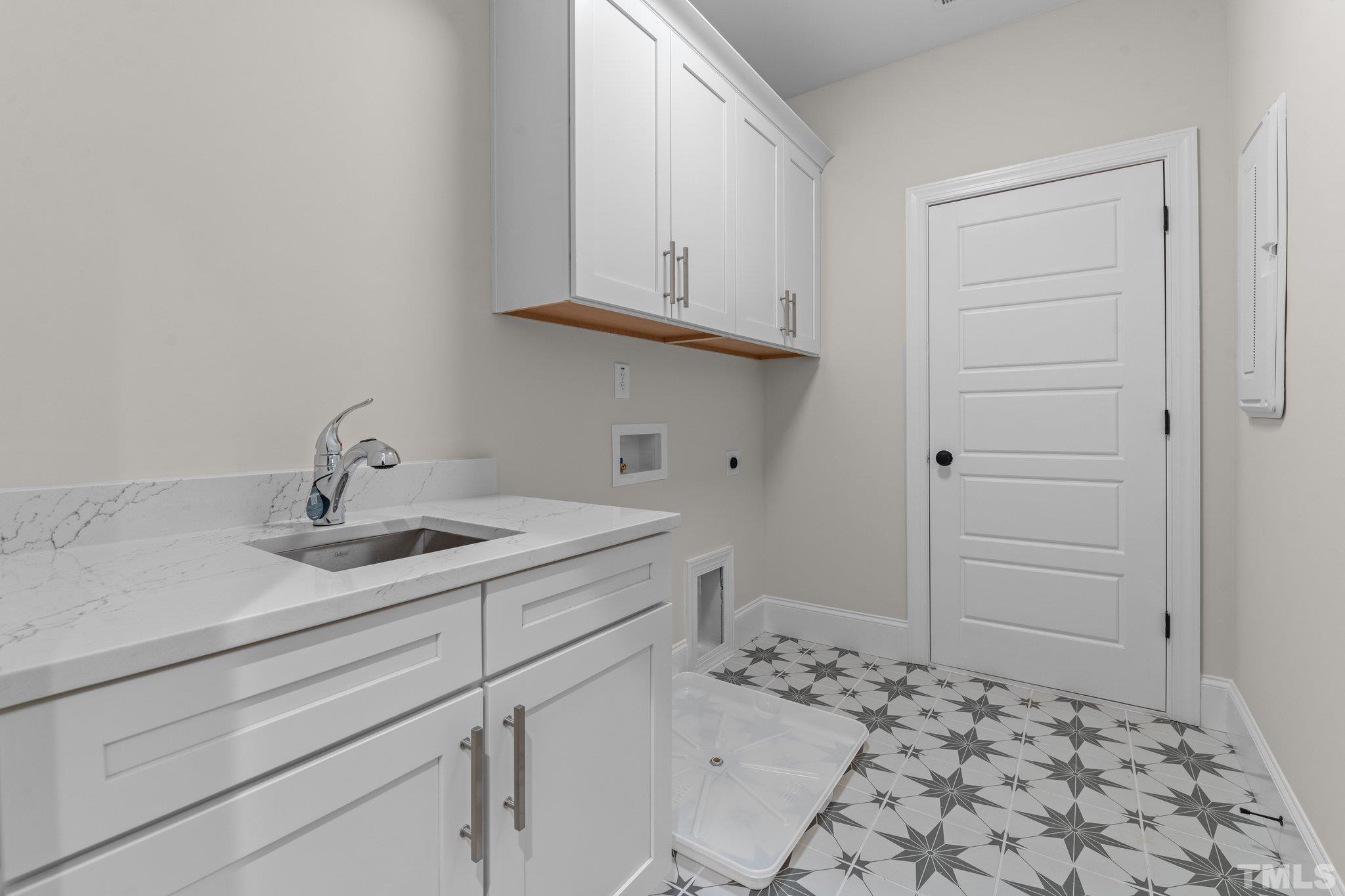 9321 Field Maple Court Raleigh, NC 27613 - Photo 38 of 44 a bathroom with a sink toilet and vanity