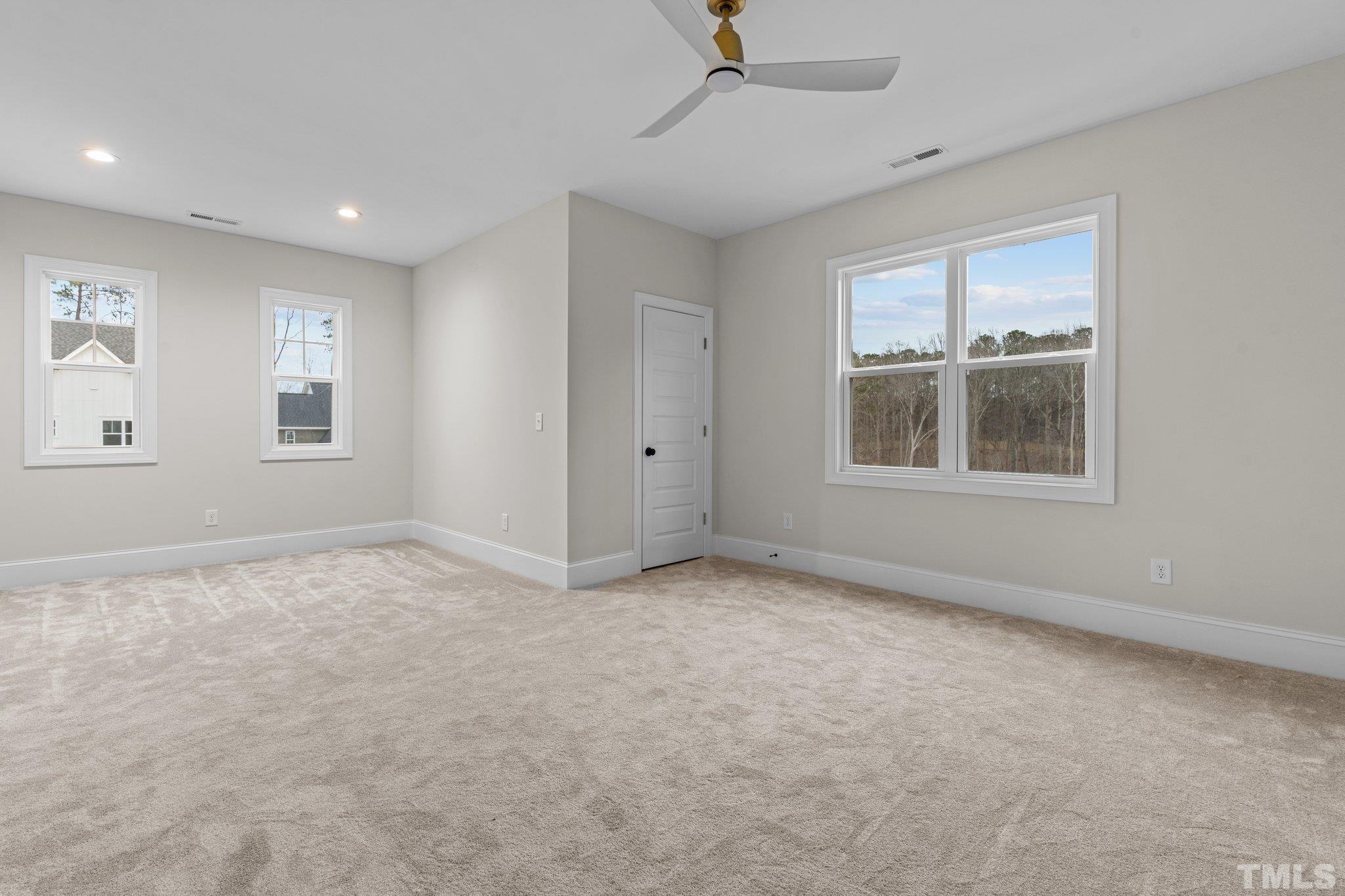 9321 Field Maple Court Raleigh, NC 27613 - Photo 39 of 44 a view of an empty room with a window