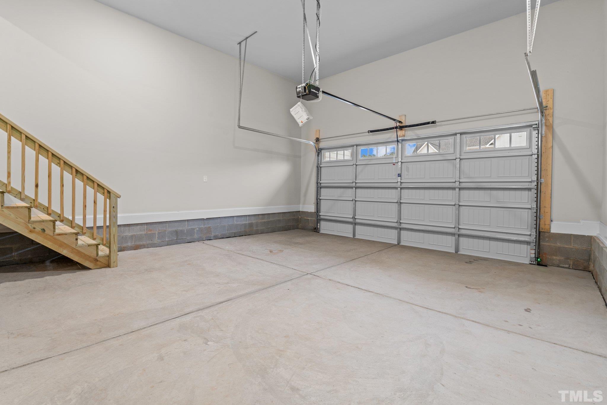 9321 Field Maple Court Raleigh, NC 27613 - Photo 40 of 44 a view of a garage