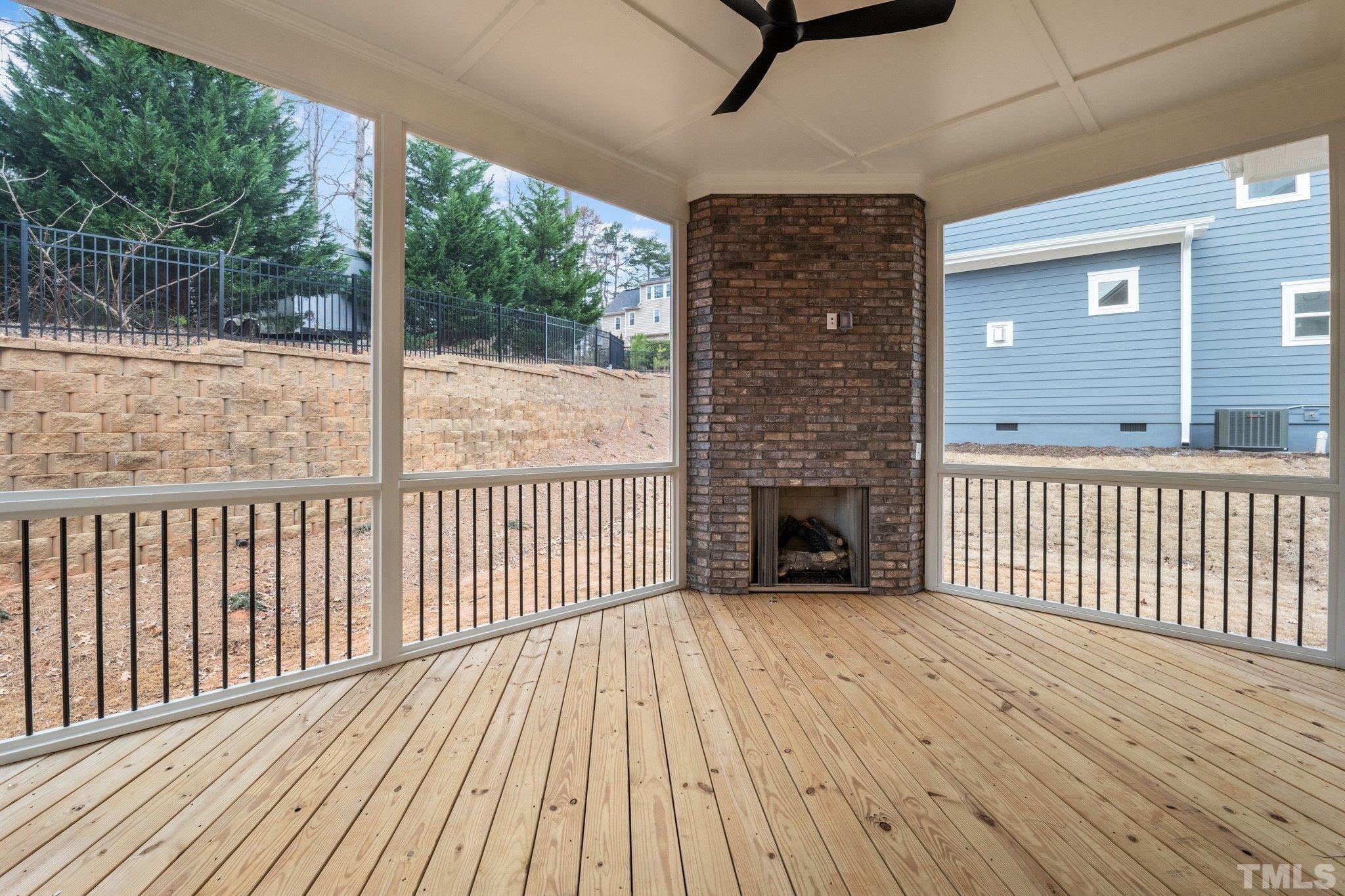 9321 Field Maple Court Raleigh, NC 27613 - Photo 41 of 44 a view of a balcony with wooden floor
