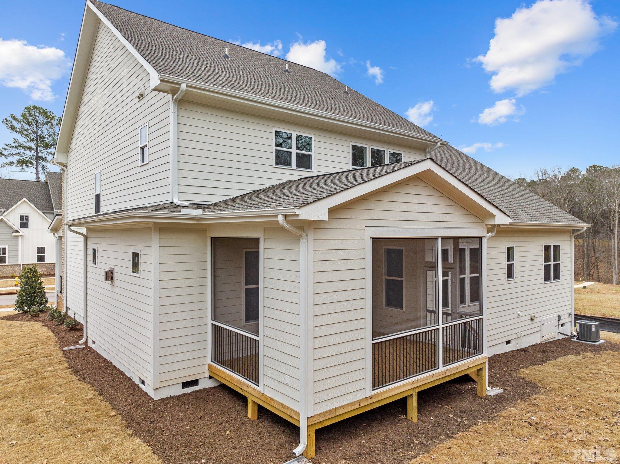 9321 Field Maple Court Raleigh, NC 27613 - Photo 42 of 44 a view of a house with a yard