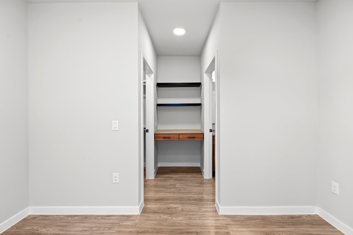 4510 Terry-O Lane, Unit 143 Austin, TX 78745 - Photo 17 of 20 a view of an empty room and wooden floor