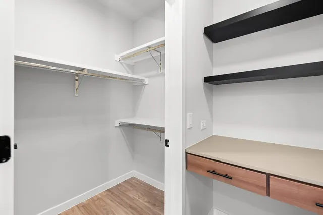 a view of an empty walk in closet