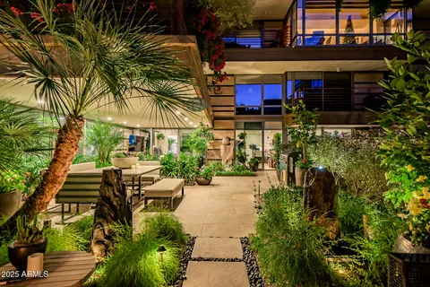a kitchen with a sink stainless steel appliances and cabinets