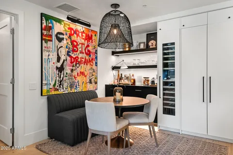 a swimming pool with outdoor seating and yard