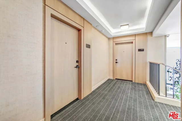 a swimming pool with outdoor seating and plants